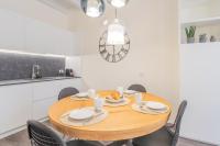 A kitchen or kitchenette at Modern & Stylish Apartment in Como City by Rent All Como