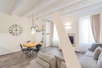 A seating area at Modern & Stylish Apartment in Como City by Rent All Como