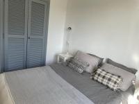 Posteľ alebo postele v izbe v ubytovaní Les restanques maison des chênes vue mer 6 personnes
