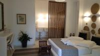 Postel nebo postele na pokoji v ubytování Valena Mare Suites & Apartments