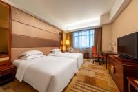 Crowne Plaza Foshan by IHG - Canton Fair free shuttle busにあるテレビまたはエンターテインメントセンター