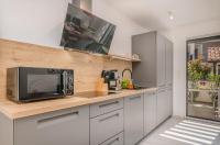 Kuchyňa alebo kuchynka v ubytovaní Modern Apartments Elle Malinska