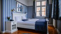 Postel nebo postele na pokoji v ubytování Hotel Ærø