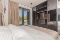 Posteľ alebo postele v izbe v ubytovaní Luxury Villa Hera
