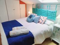Posteľ alebo postele v izbe v ubytovaní Apartamento Saint Michael Blue