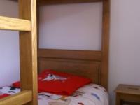 Cama ou camas em um quarto em Appartement Les Adrets-Prapoutel, 4 pi&egrave;ces, 8 personnes - FR-1-557-29