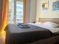 Posteľ alebo postele v izbe v ubytovaní Apt w/ View of OlympusZeusTemple/4BEDR-3BATH-2KITC