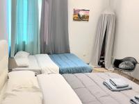 Posteľ alebo postele v izbe v ubytovaní Apt w/ View of OlympusZeusTemple/4BEDR-3BATH-2KITC