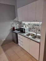 Kuchyňa alebo kuchynka v ubytovaní Center Point Thessaloniki