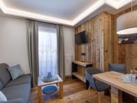 Televízia a/alebo spoločenská miestnosť v ubytovaní Mountain Dream by Apartment Managers