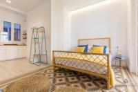 Posteľ alebo postele v izbe v ubytovaní Living4Malaga Skyline Apartments