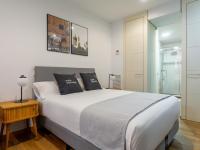 Postel nebo postele na pokoji v ubytování limehome Madrid San Lorenzo