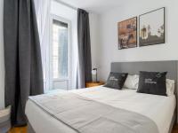 Postel nebo postele na pokoji v ubytování limehome Madrid San Lorenzo