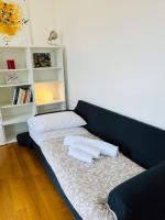 A bed or beds in a room at POLITEAMA SUITE IN THE HEART OF THE CITY