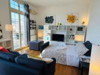 A seating area at POLITEAMA SUITE IN THE HEART OF THE CITY