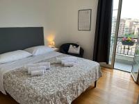 A bed or beds in a room at POLITEAMA SUITE IN THE HEART OF THE CITY