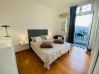 A bed or beds in a room at POLITEAMA SUITE IN THE HEART OF THE CITY