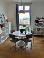 A seating area at POLITEAMA SUITE IN THE HEART OF THE CITY