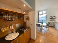 A kitchen or kitchenette at POLITEAMA SUITE IN THE HEART OF THE CITY