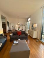A seating area at POLITEAMA SUITE IN THE HEART OF THE CITY