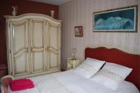Łóżko lub łóżka w pokoju w obiekcie Chez Vivi et Jean Pierre Maison 8 à 9 personnes au calme vue montagne WIFI