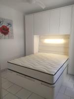 Postel nebo postele na pokoji v ubytování Casa Dany