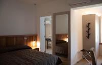 Posteľ alebo postele v izbe v ubytovaní Hotel Oliva