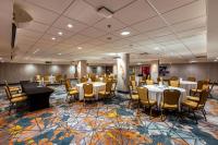 a banquet room with tables and chairs in a hotel at Holiday Inn Toronto Downtown Centre by IHG in Toronto
