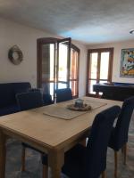 A seating area at VILLA VITTORIA with PRIVATE HEATED SWIMMING POOL COMPLETE WITH HIDROMASSAGE FOR EXCLUSIVE USE , SEA VIEW, 150 METERS FROM THE BEACH