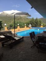 The swimming pool at or close to VILLA VITTORIA with PRIVATE HEATED SWIMMING POOL COMPLETE WITH HIDROMASSAGE FOR EXCLUSIVE USE , SEA VIEW, 150 METERS FROM THE BEACH
