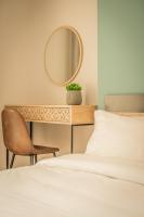 A bed or beds in a room at Hermes Apartment on Aristotelous Midas Home