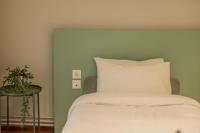 A bed or beds in a room at Hermes Apartment on Aristotelous Midas Home