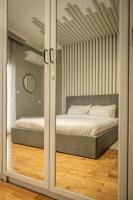 A bed or beds in a room at Hermes Apartment on Aristotelous Midas Home
