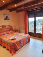 Posteľ alebo postele v izbe v ubytovaní Allotjament Rural Casa Bernat