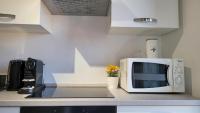 Kuchyňa alebo kuchynka v ubytovaní Milano City Apartments - Stylish House Free WiFi-Parking-Airport