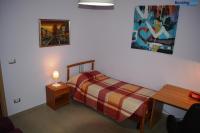 A bed or beds in a room at Da Aloisia - Casa Vacanze