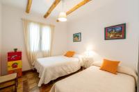 Postel nebo postele na pokoji v ubytování Vivienda Rural Las Bartolas