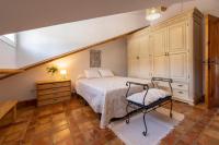 Postel nebo postele na pokoji v ubytování Vivienda Rural Las Bartolas