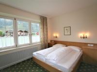 A bed or beds in a room at Apartment Rauter-1 by Interhome