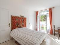 a bedroom with a bed and a window at Apartment Le Chalet by Interhome in Cabourg