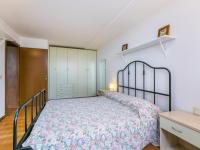 A bed or beds in a room at Apartment Bucaneve by Interhome