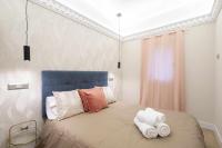 Łóżko lub łóżka w pokoju w obiekcie Reformado decorado céntrico 1 dormitorio