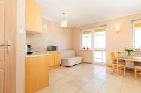 Kuchyňa alebo kuchynka v ubytovaní Rezydencja Spacerowa Apartamenty by Noclegi Renters