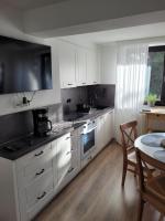 Kuchyňa alebo kuchynka v ubytovaní Villa Pinia