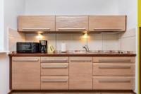 Kuchyňa alebo kuchynka v ubytovaní Rezydencja Spacerowa Apartamenty by Noclegi Renters