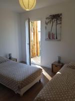 Posteľ alebo postele v izbe v ubytovaní Dune Blanche 300 m de l'Océan, appartement neuf 6 personnes