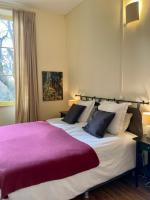 Posteľ alebo postele v izbe v ubytovaní Villa Vallière bed&breakfast