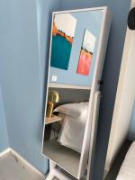 A bed or beds in a room at DIZETA Suite and Apartment