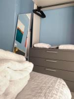 A bed or beds in a room at DIZETA Suite and Apartment