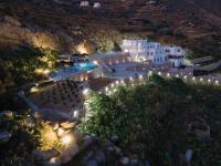 an aerial view of a resort at night with lights at WOW Panoramic View Deluxe Villas in Agkidia